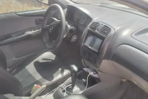 مزدا، 323
