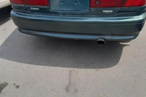 مزدا، 323