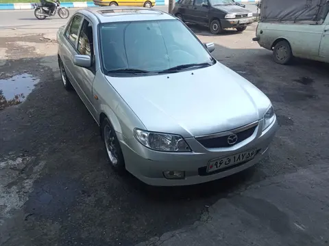 مزدا، 323