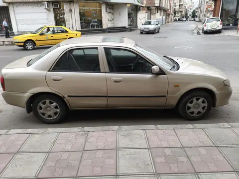 مزدا، 323