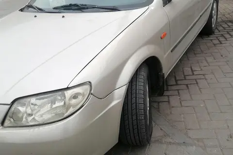 مزدا، 323