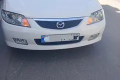 مزدا، 323