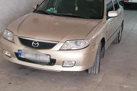 مزدا، 323