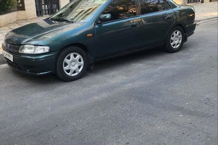 مزدا،  323