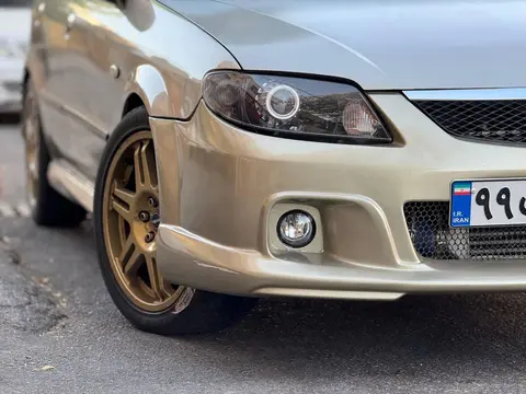مزدا، 323