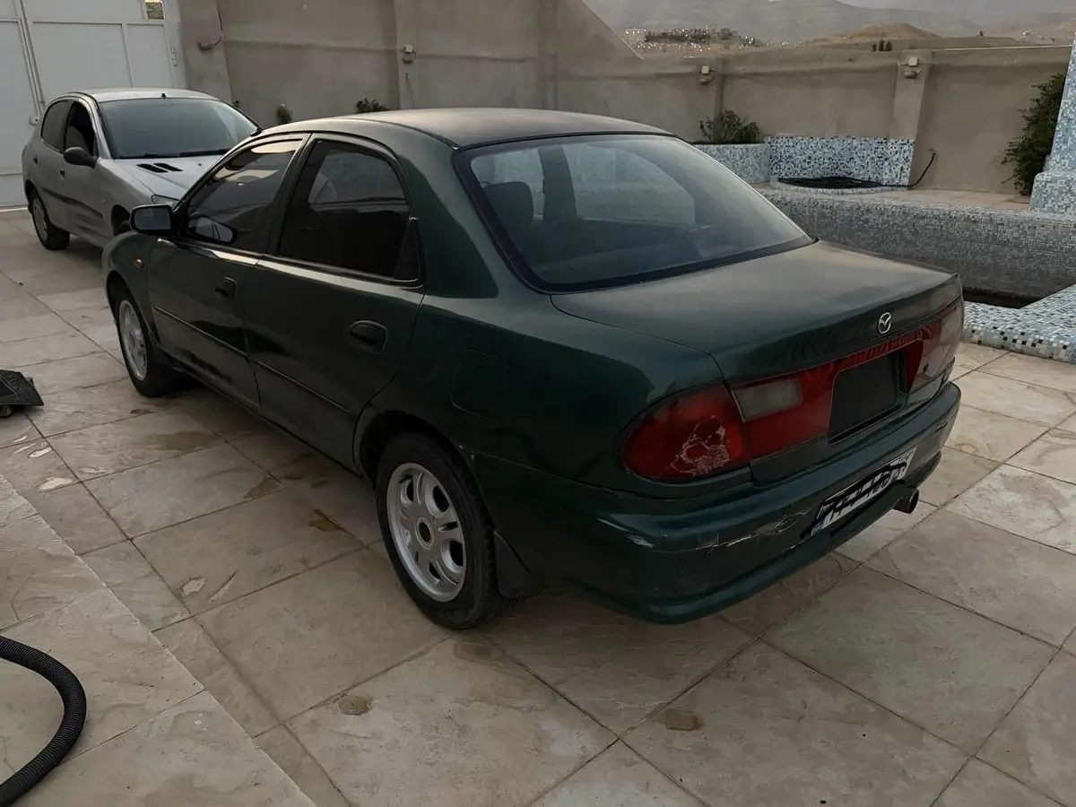 مزدا،  323