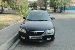 مزدا، 323
