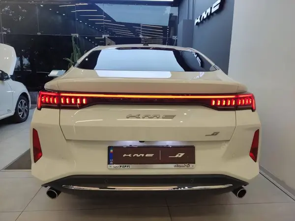 کی ام سی  J7