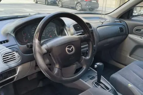 مزدا، 323
