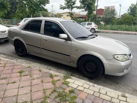مزدا، 323